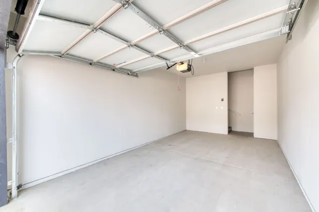 Private garage with a roll-up door