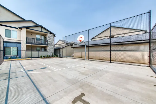 Basketball court with fencing and hoops