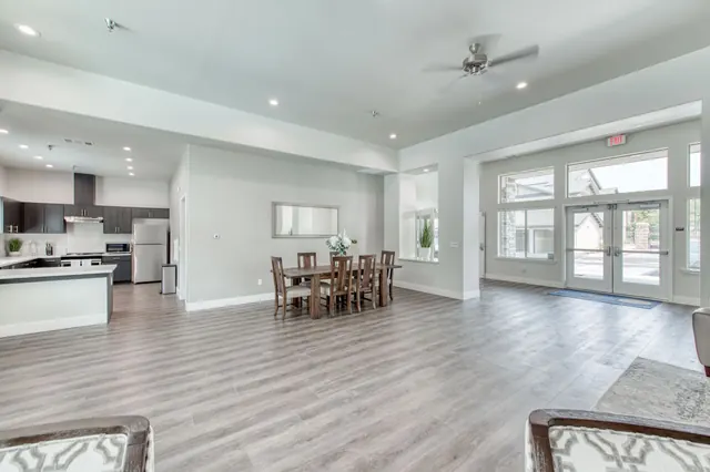 Clubhouse great room with the kitchen and dining table