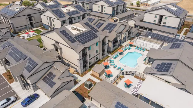 Aerial view over the rooftops toward the pool